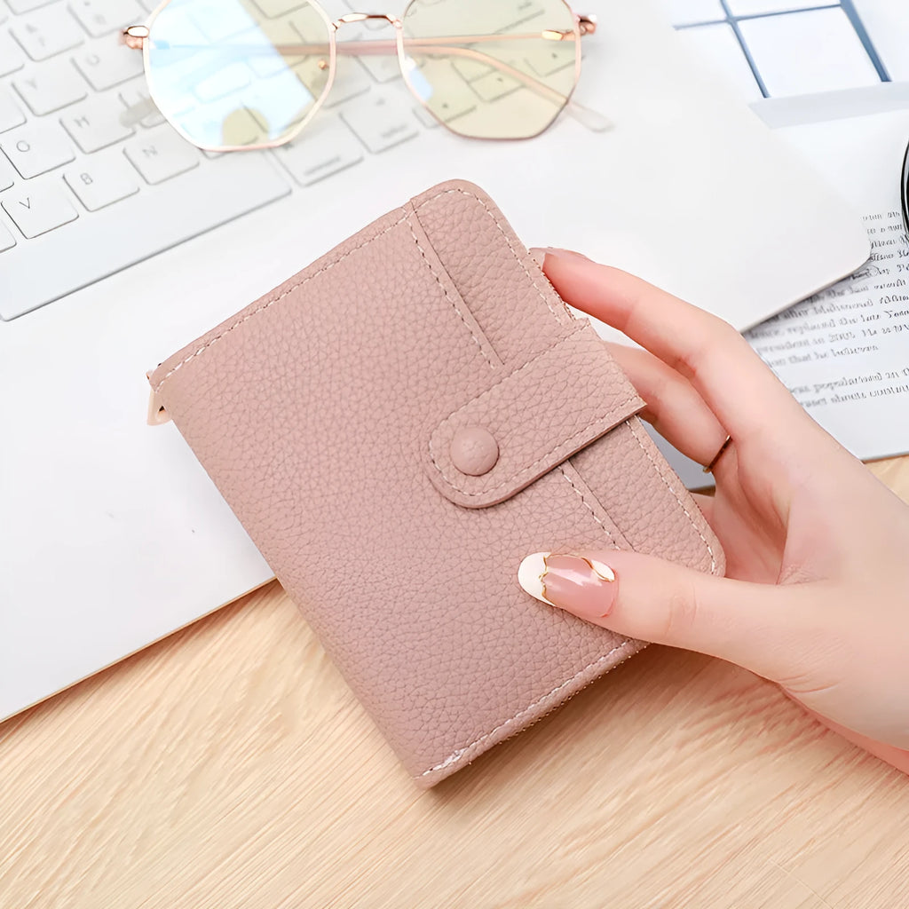 Ladies short wallet with lychee pattern in two-fold design showing four colour options