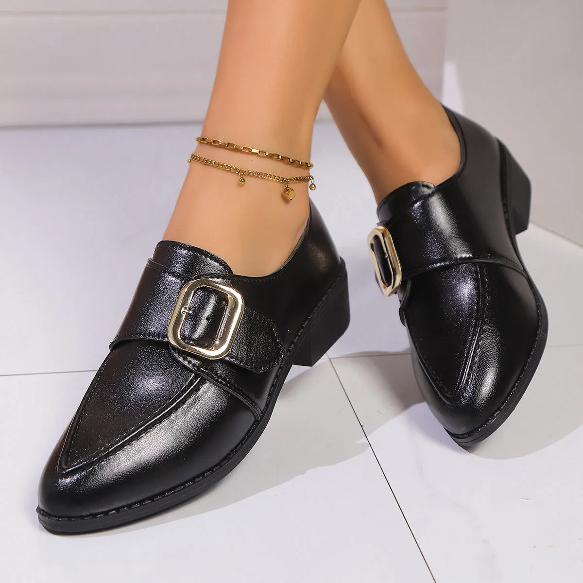 Women's British-style leather shoes with bow detail showing PU upper and rubber sole construction