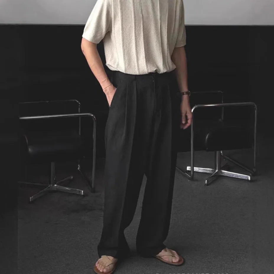 Men's light-weight apricot coloured cotton linen trousers with a loose Korean fit and pencil leg opening.