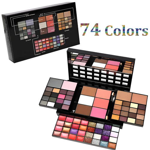 Open 74-colour makeup palette showing four layers of eyeshadow, lip gloss, blush, and contour powders with included brushes.