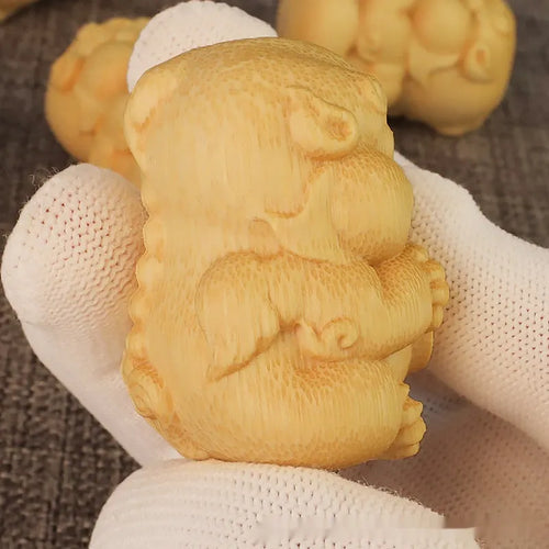 Small solid bamboo carving ornament with traditional craft style, 4.5cm tall.