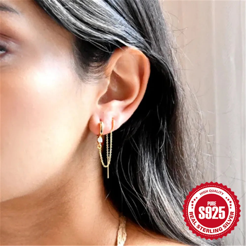 S925 sterling silver ear clip studs with flower, tassel and chain design in golden electroplated finish