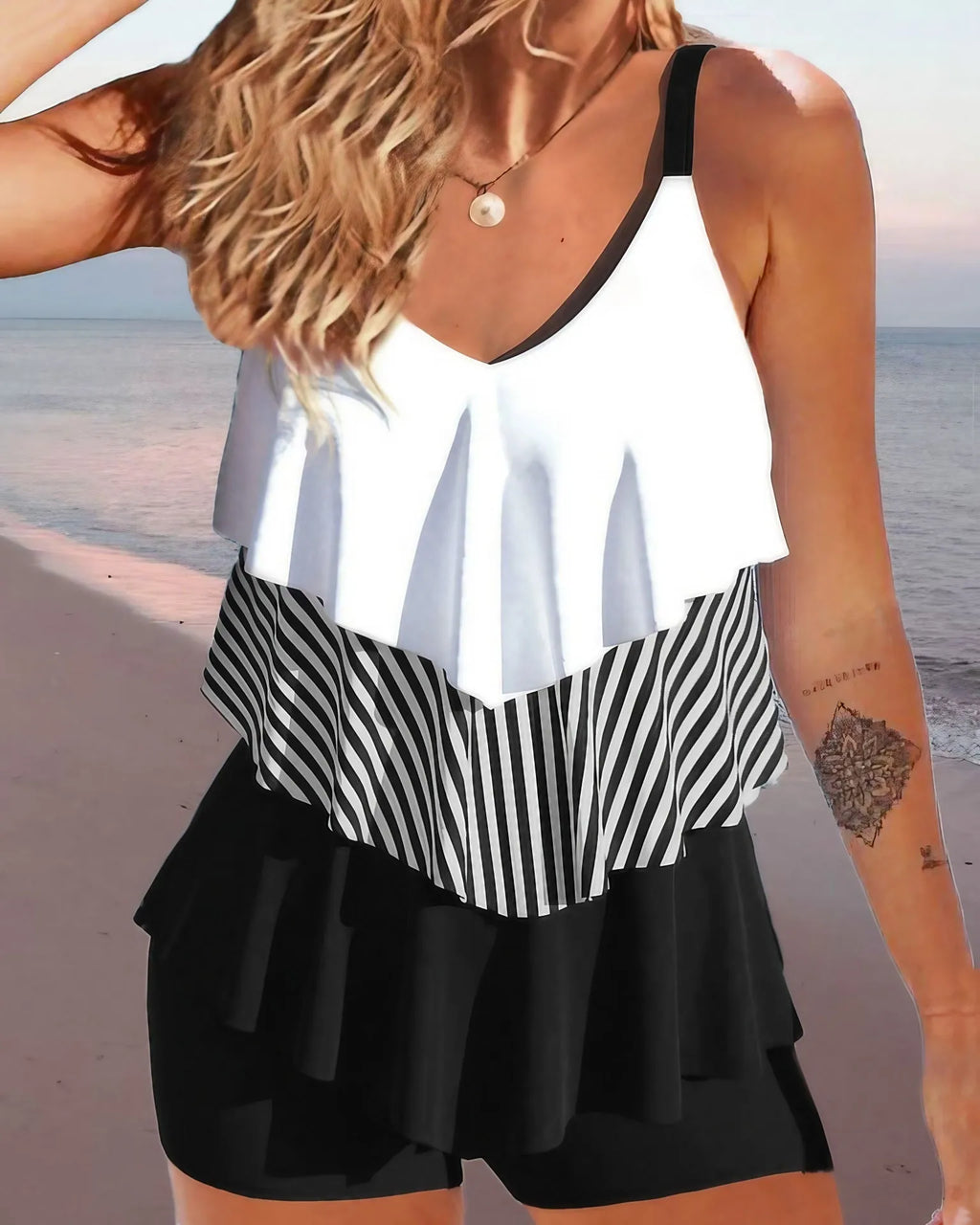 Women's sleeveless backless ruffle bikini swimsuit with spaghetti straps in solid colour, floral, or gradient pattern