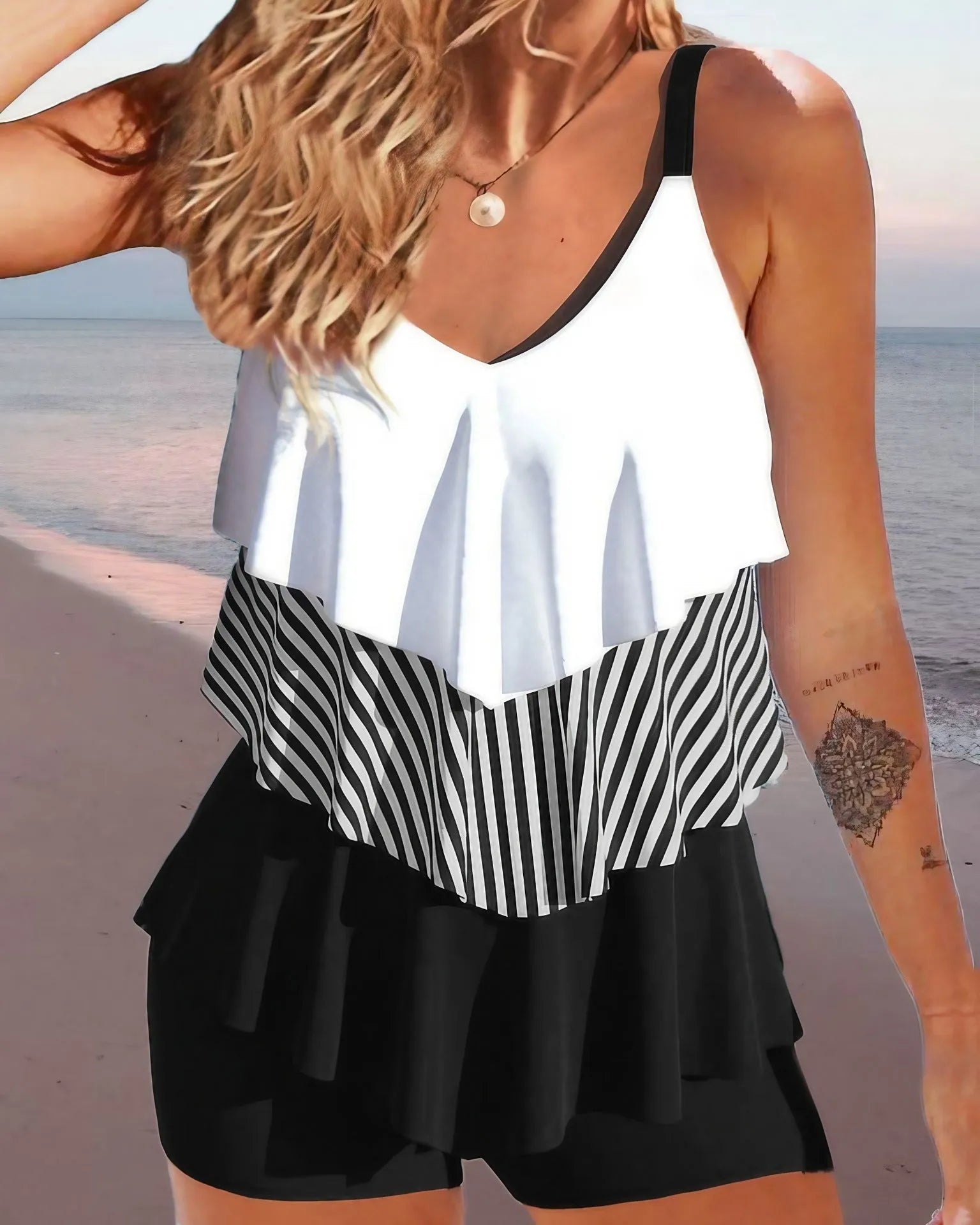 Women's sleeveless backless ruffle bikini swimsuit with spaghetti straps in solid colour, floral, or gradient pattern