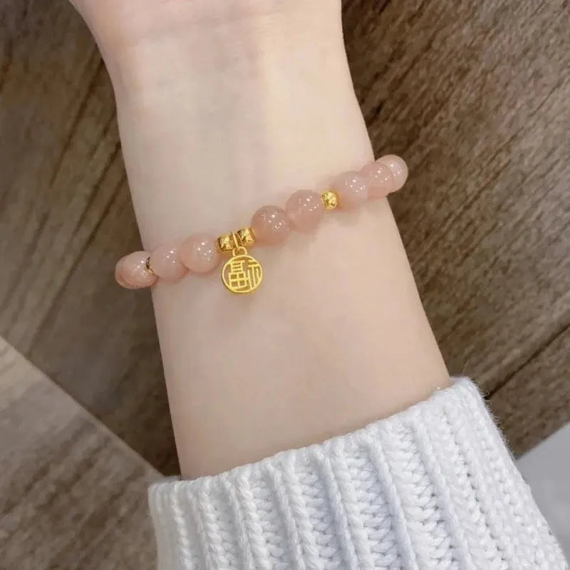 Chinese style bamboo leaf glass bracelet for women with a bamboo joint design.