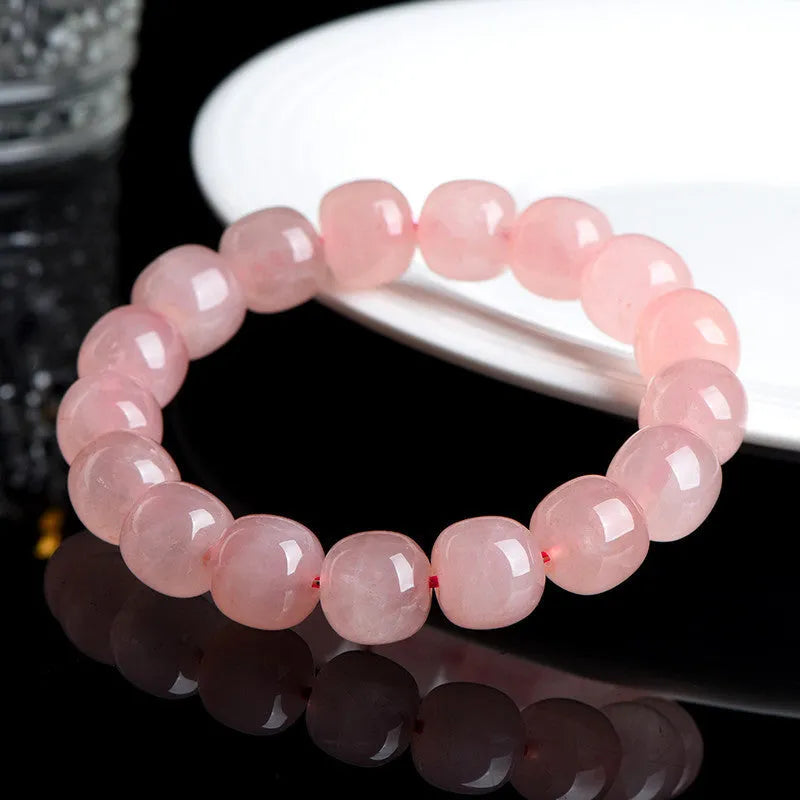 Natural pink crystal barrel bead bracelet with 8x10mm geometric polished beads