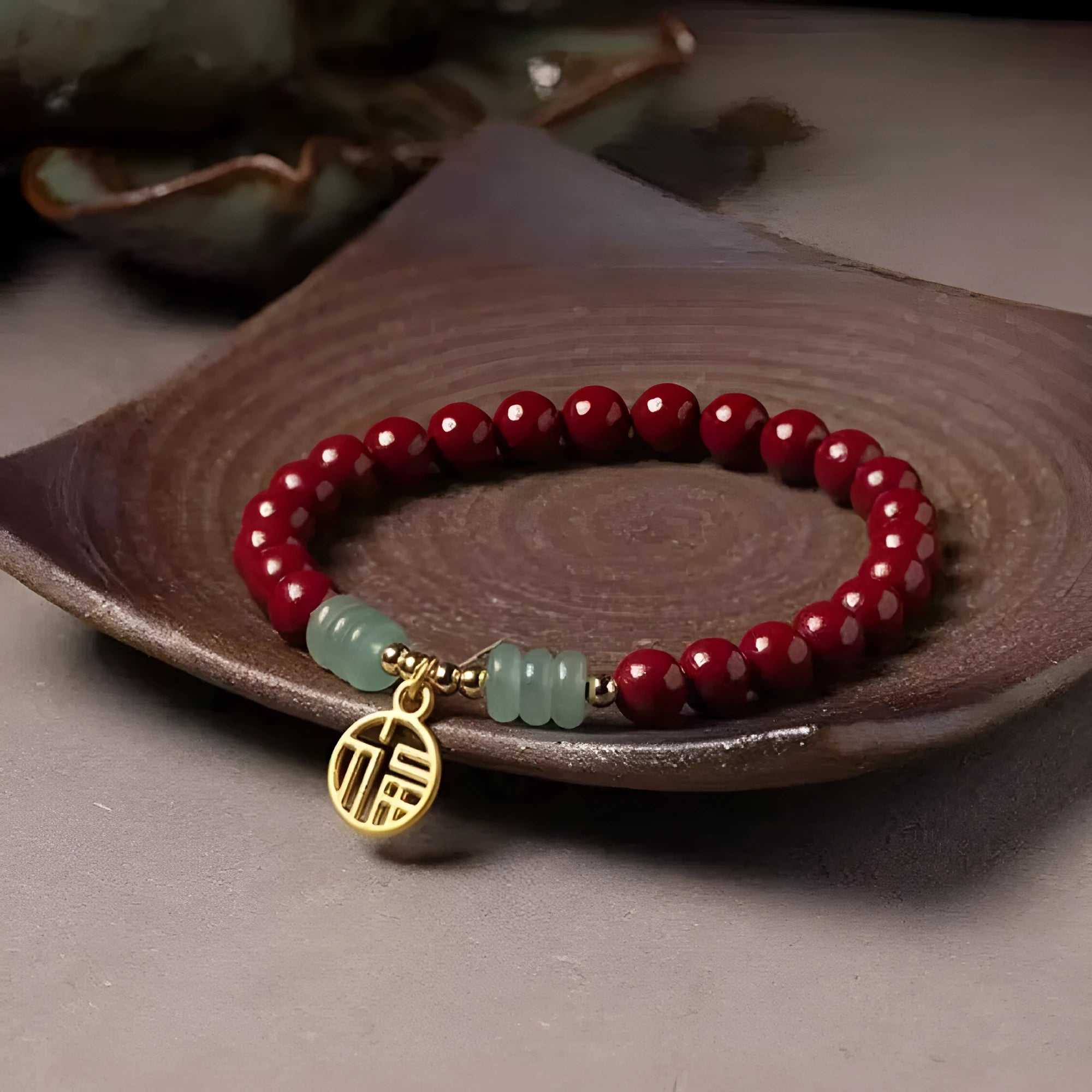 Handcrafted Chinese cinnabar bracelet with gold copper beads in wave design on wrist