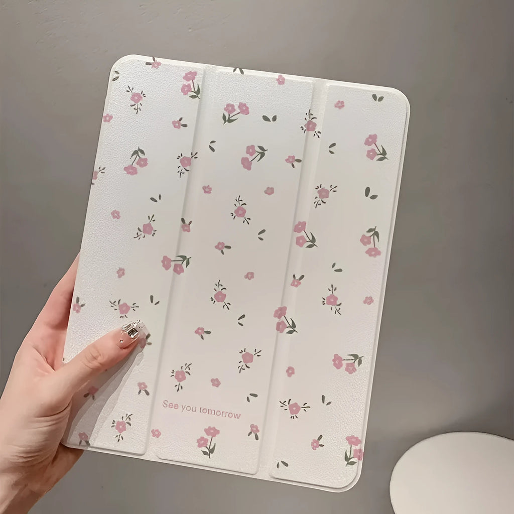 Transparent floral tri-fold iPad case with magnetic stand bracket shown open