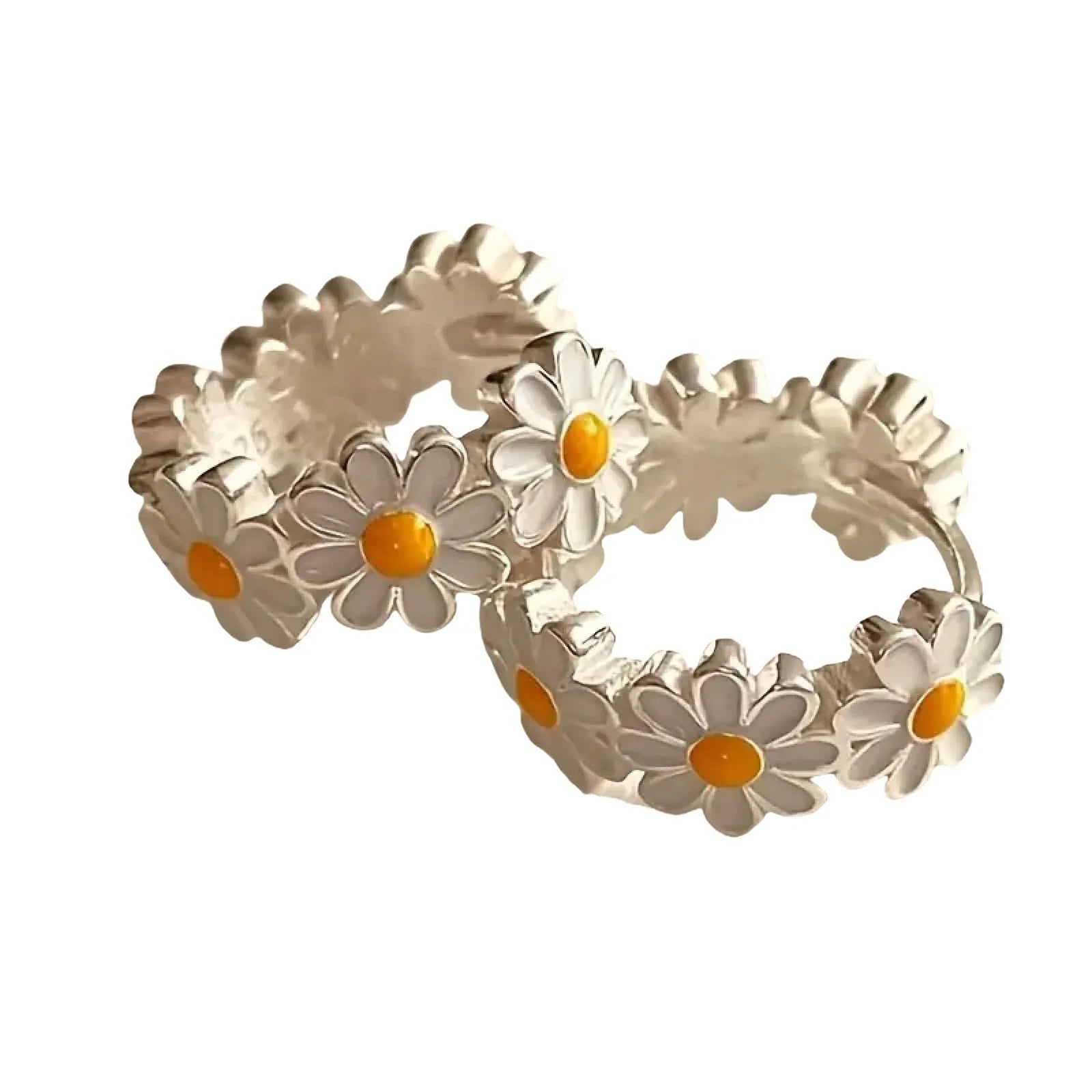 White daisy flower fashion ring earrings with platinum-set gems on a model.