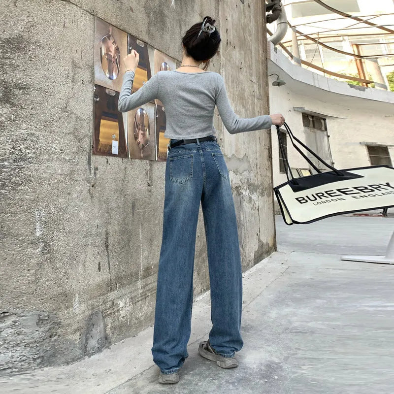 Women's high-waisted straight-leg jeans in retro blue cotton denim showing front view