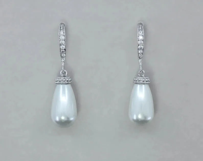 Silver alloy drop earrings with fully-inlaid artificial freshwater pearl and shell pearl surface