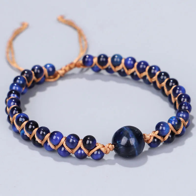 Handmade woven geometric pull bracelet with stone beads in blue tigereye or amethyst colours