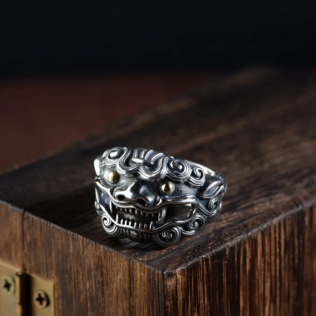 Personalised Jibeast pattern open style silver diamond ring on a hand.