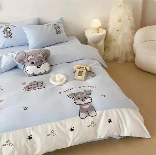 Schnauzer cartoon patterned bedding set with quilt cover, sheet, and pillowcases on bed