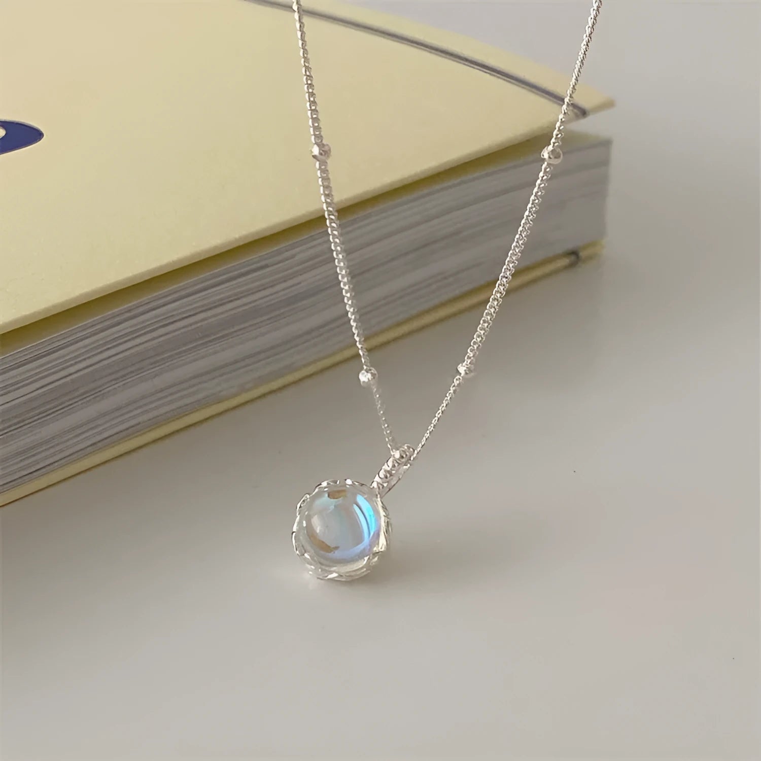 Women's geometric pendant necklace with adjustable silver chain and polished 925 silver finish