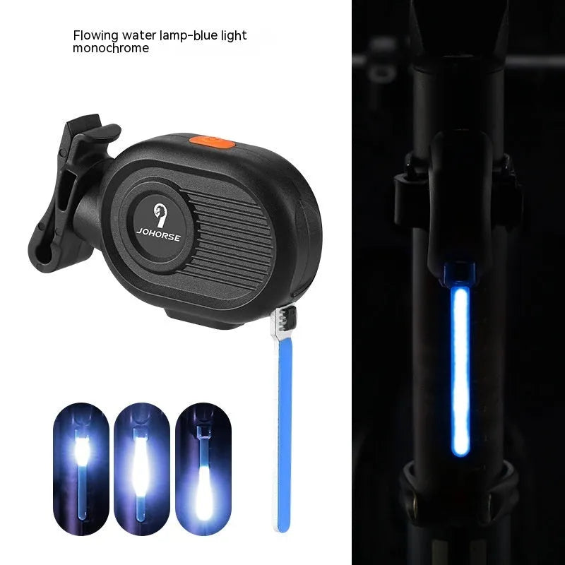 Bicycle running water taillight showing blue waterfall light effect on a bike seat post