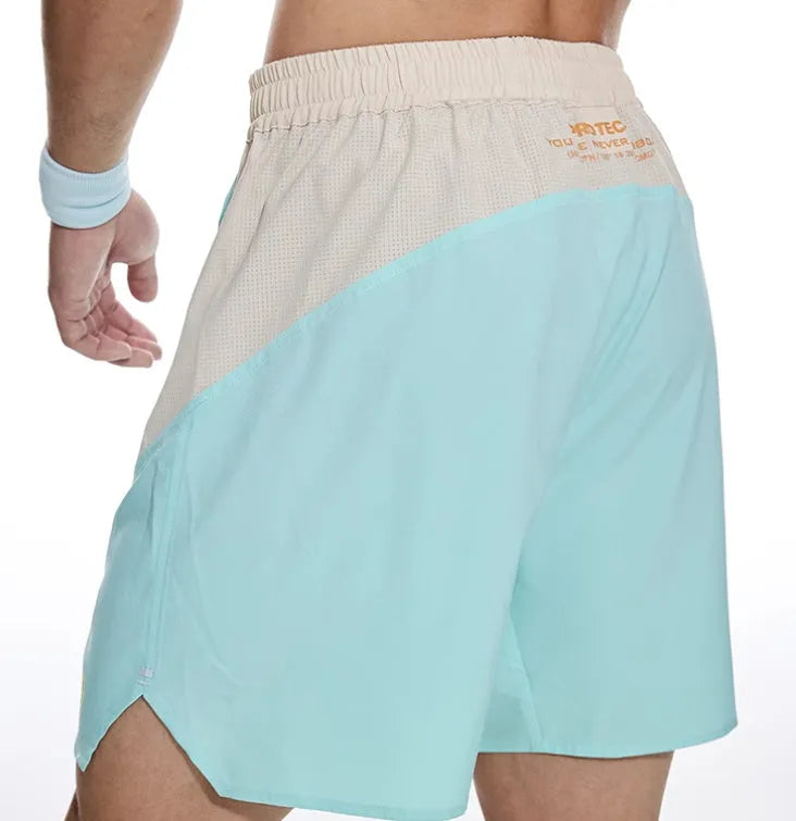 Men's loose-fit gym shorts in dark grey for weight training with elastic lace-up waistband.