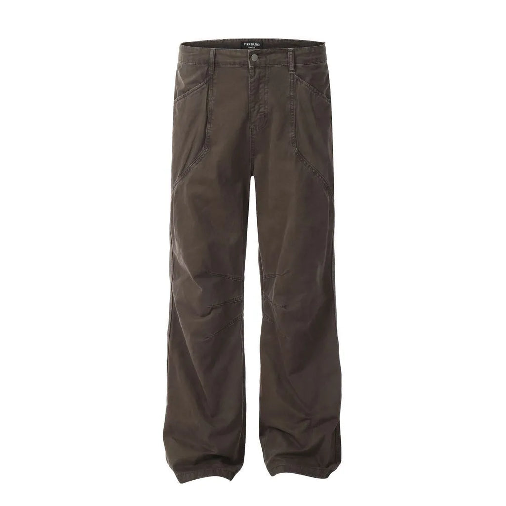 Men's brown straight-leg cotton trousers showing high-waist design and traditional straight-leg silhouette