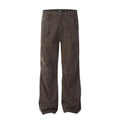 Men's brown straight-leg cotton trousers showing high-waist design and traditional straight-leg silhouette