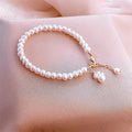 White freshwater pearl cat paw bracelet with electroplated finish for women