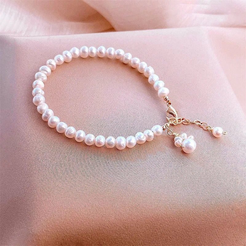 White freshwater pearl cat paw bracelet with electroplated finish for women
