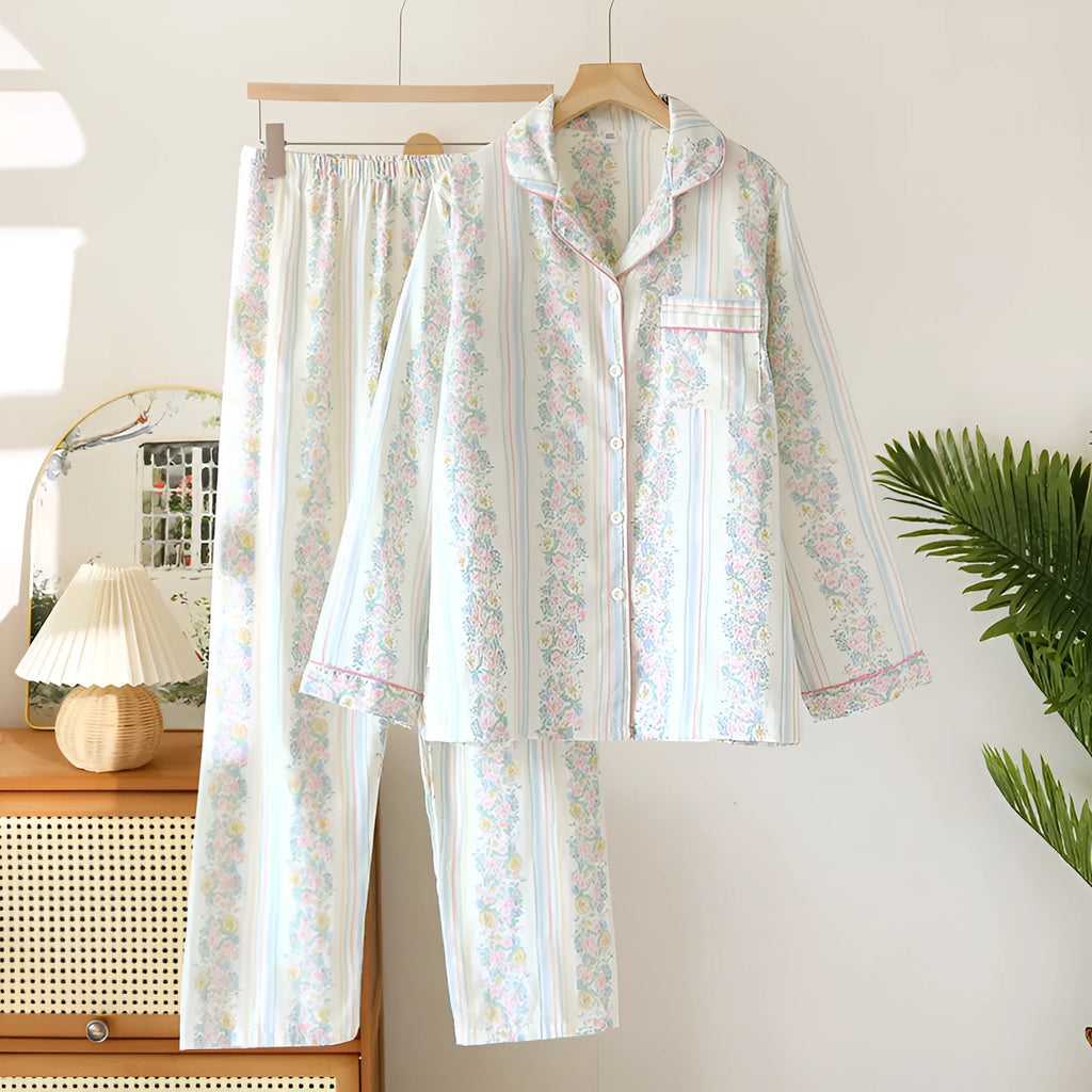 Ladies' long-sleeved cotton gauze homewear set in a striped floral print, showing top and trousers laid flat.