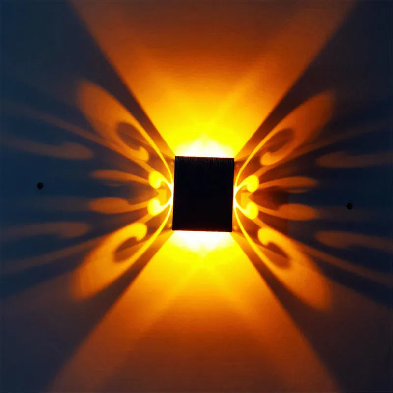 Butterfly-shaped LED wall lamp with aluminium shade and remote control for colour selection