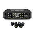 Solar external tyre pressure monitor display unit with colour screen next to six tyre sensors.