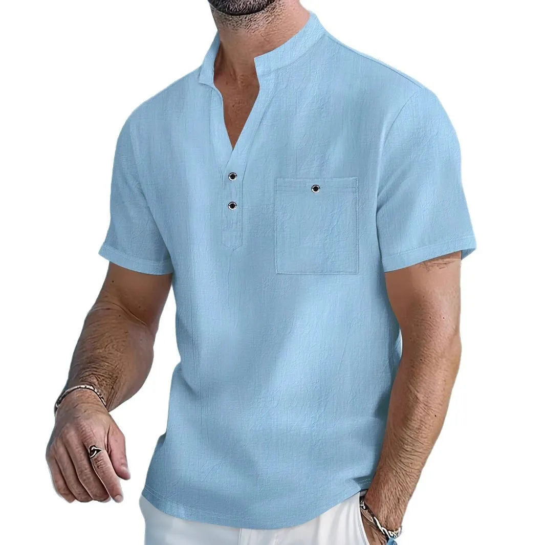 Men's light blue linen stand collar short sleeve shirt laid flat showing loose fit