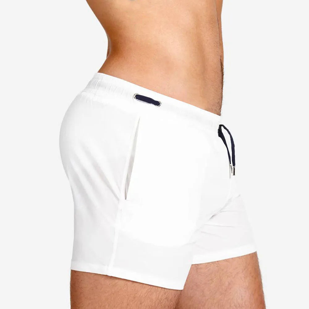 Man's mesh lining sports shorts in army green colour for swimming and fitness