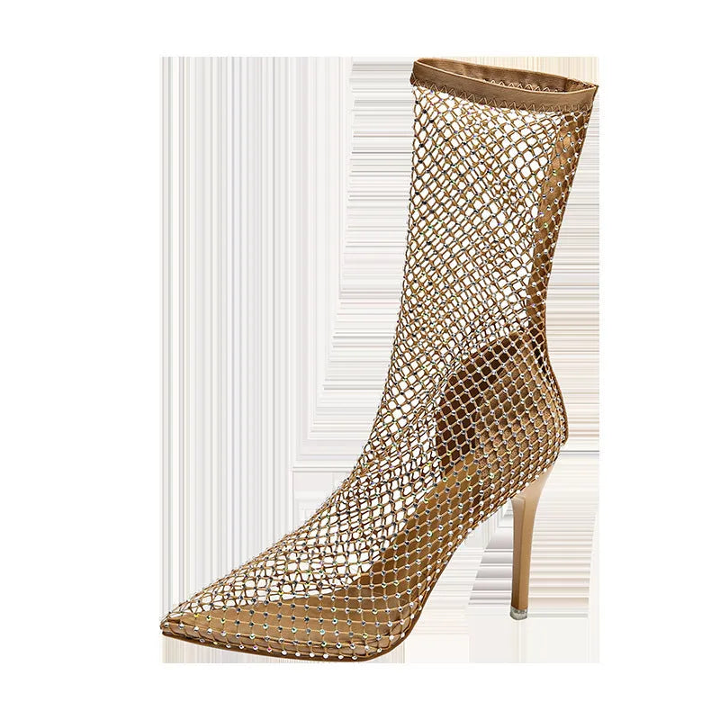Gold coloured women's stiletto sandals with mesh upper and pointed toe.
