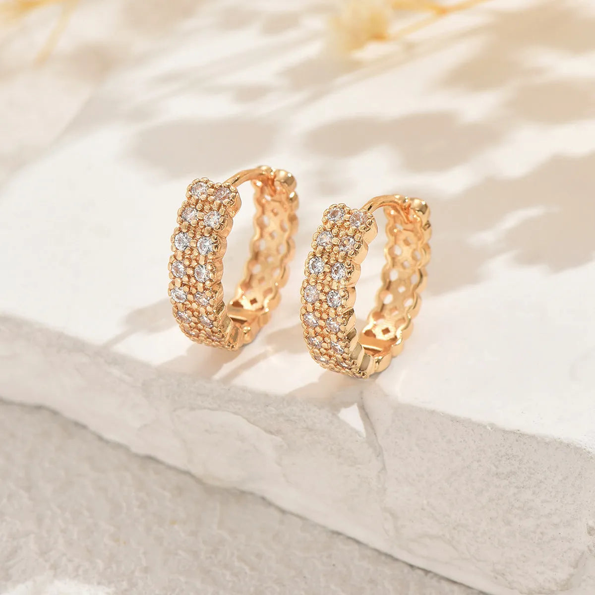 Geometric pattern copper ear studs with round dot ring design in colour DE20288