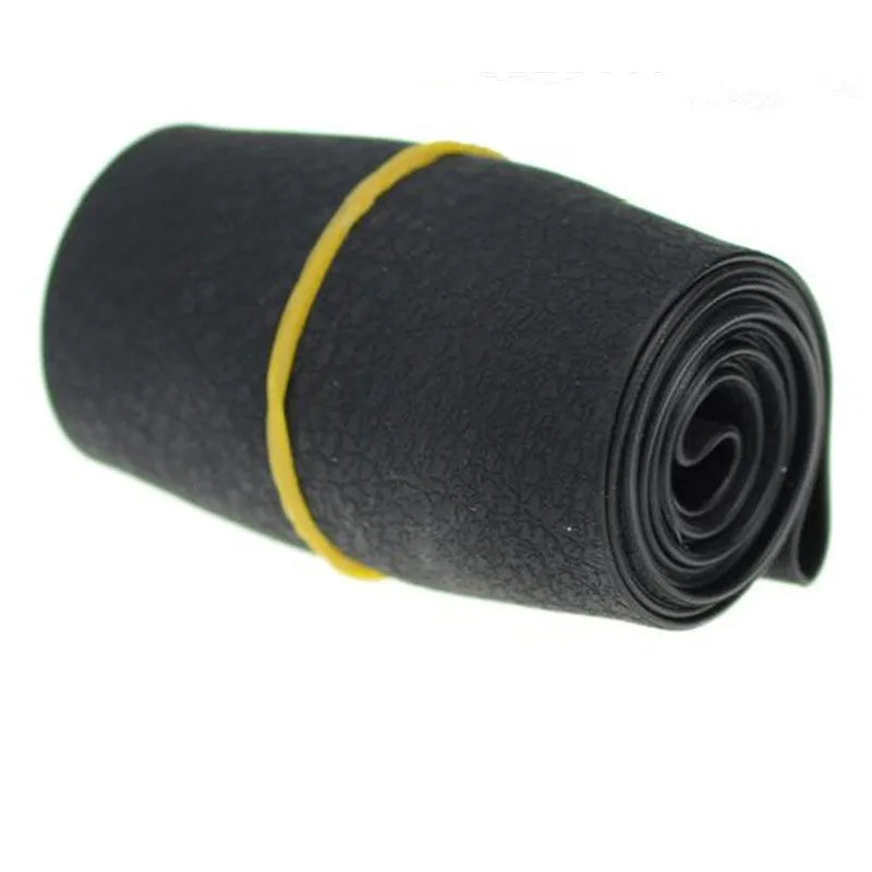 Anti-slip silicone steering wheel cover with round leather pattern in black for small cars, 32-40cm diameter