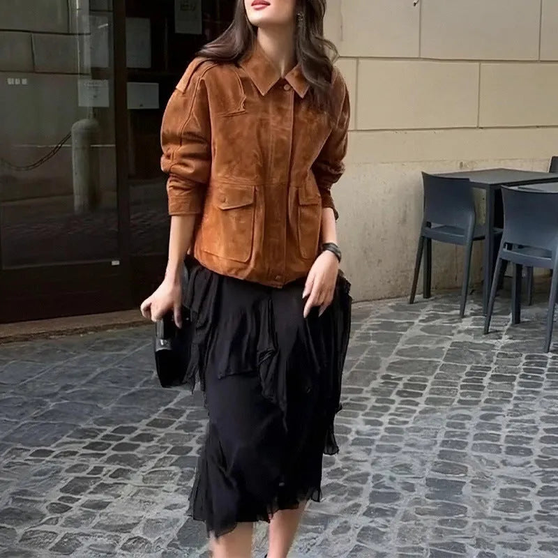Women's brown polyester suede coat with regular sleeves on a hanger.