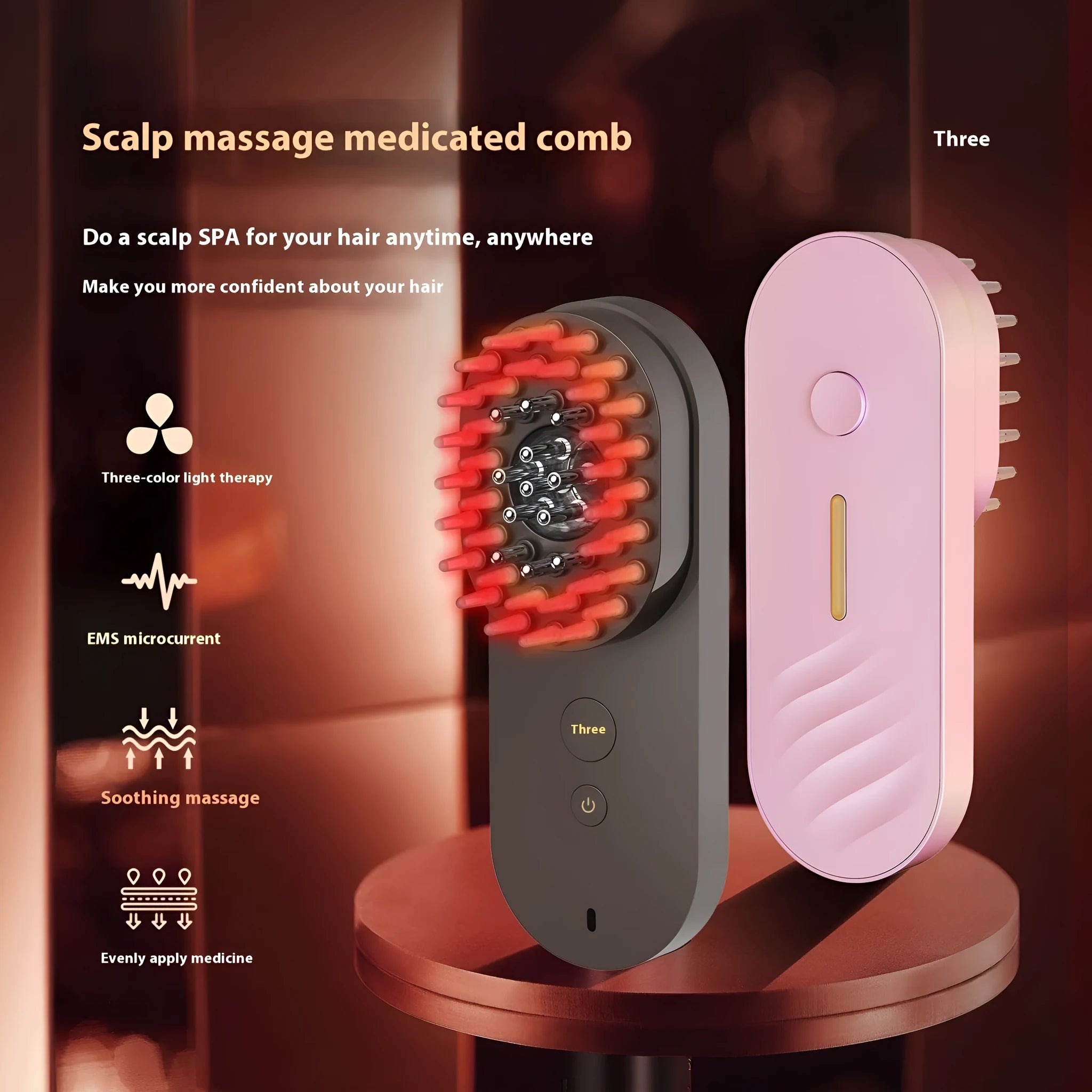 Black and pink smart massage comb with red light therapy function for scalp care.