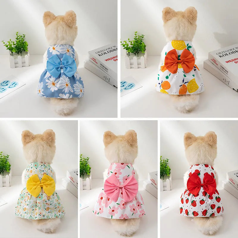 Ultra-thin summer pet dress for dog or cat with decorative floral butterfly knot bow.