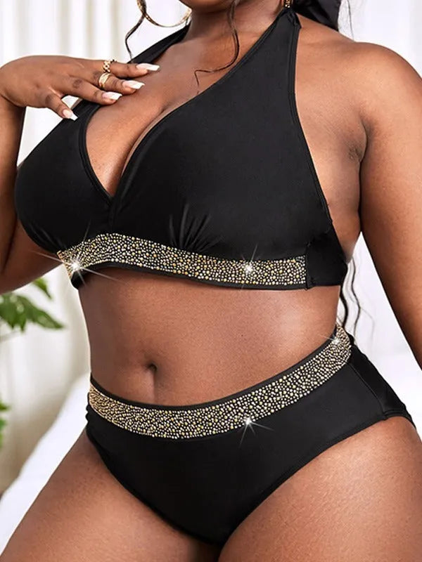 Black plus size women's bikini swimsuit with bra and shorts on a mannequin.