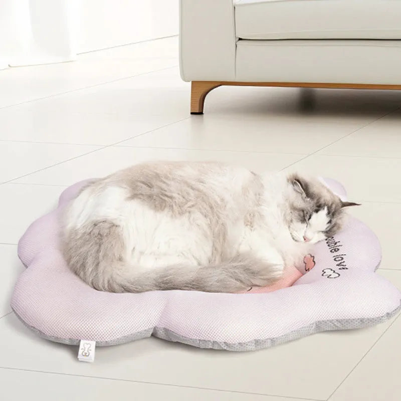 Green and pink ice silk pet cooling mat for dogs and cats shown in four different sizes.
