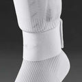 Elastic rubber shin guard strap for football and sports in red, blue, black, white colours.