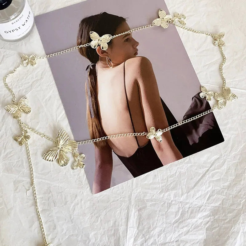 Gold or silver alloy butterfly waist chain measuring 104cm in length.