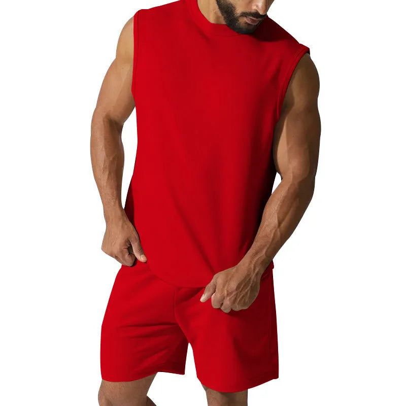 Men's sleeveless cotton blend sports top and matching shorts in a solid colour on a hanger.