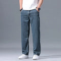 Men's loose straight-leg lyocell jeans in light blue colour with zipper fly.