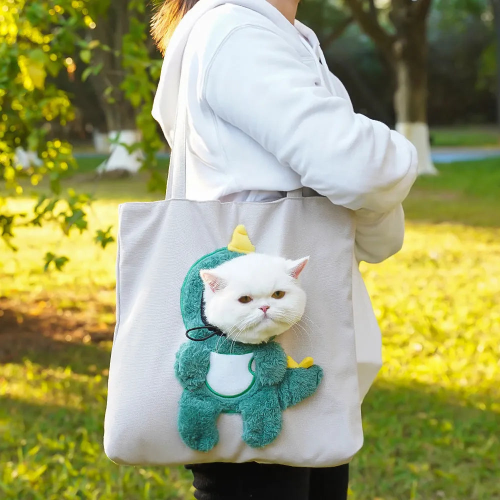 Canvas pet shoulder bag with cartoon pattern for small dog or cat transport