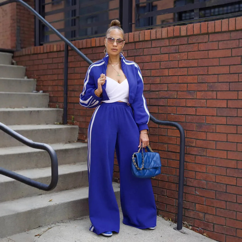 Street hipster two-piece striped suit set with top and trousers in polyester fabric