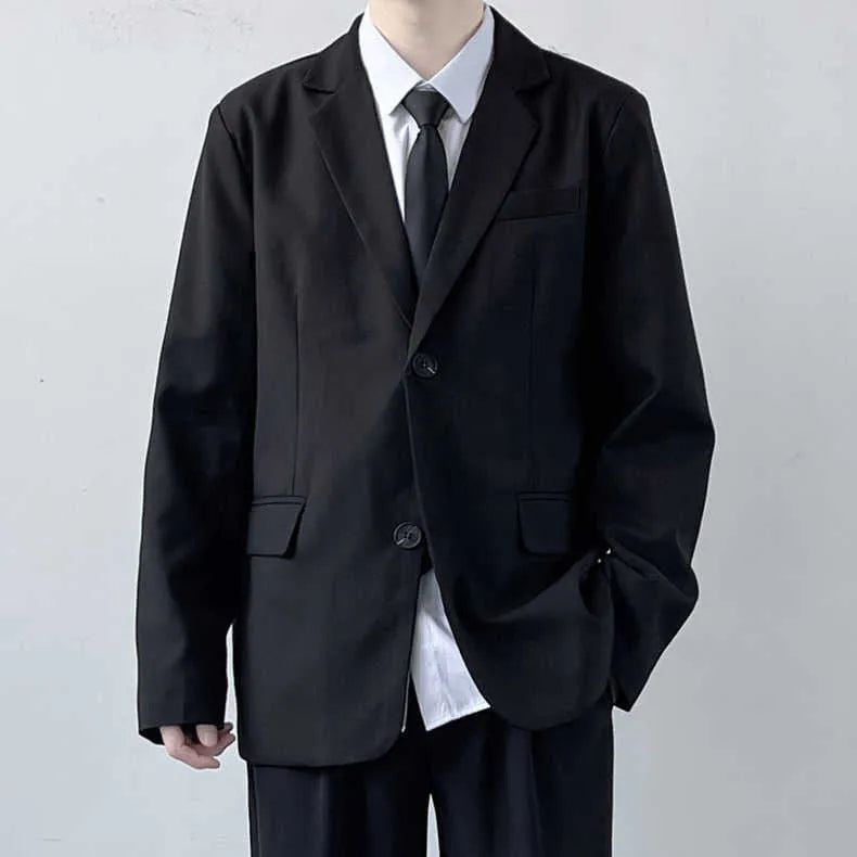 Men's plus size college style suit set in grey, featuring a blazer, trousers, white shirt, and tie.