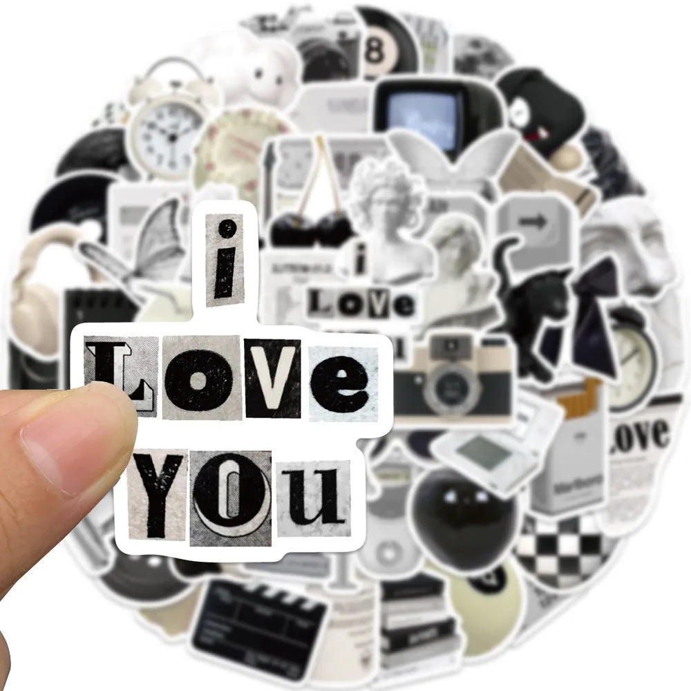 Pack of 61 black and white waterproof PVC stickers for laptops and drinkware.