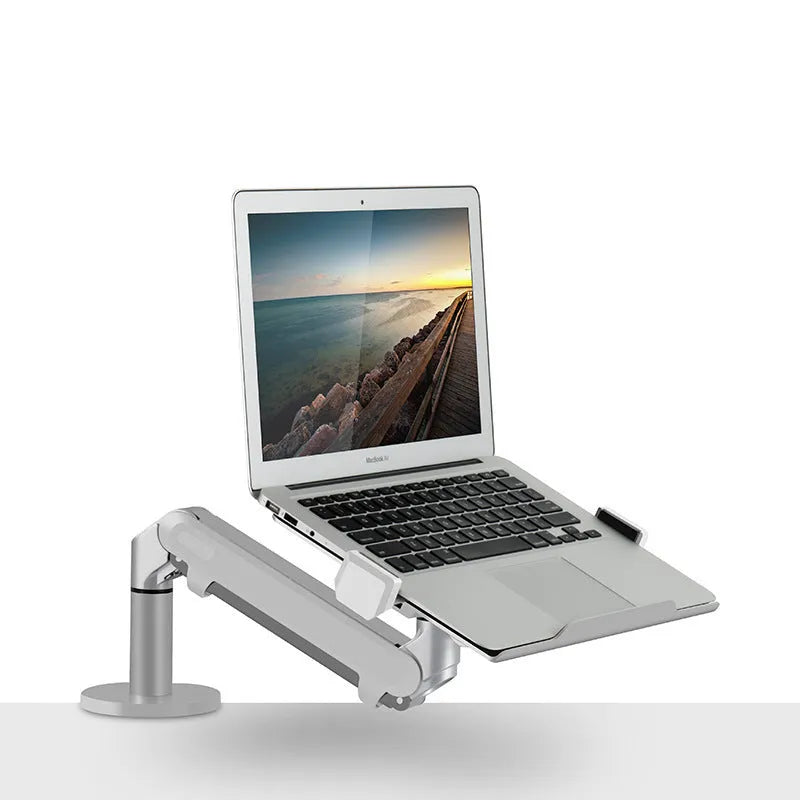 Silver aluminium laptop stand with hover design and air pressure arm bracket elevating a notebook