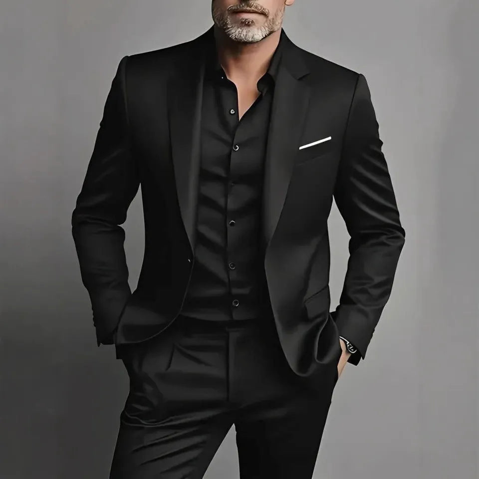 Men's slim fit casual two-piece suit set in black cotton blend fabric with coat and trousers on a hanger.