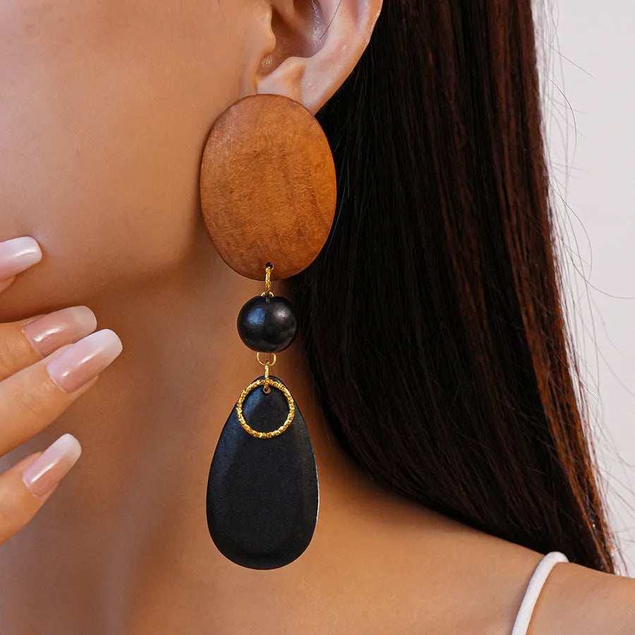 Brown-black wooden ellipse earrings with silver needle detailing in retro European American style