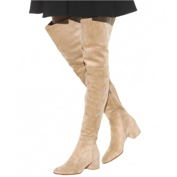 Grey women's flat over the knee suede boots with a pointed toe and low thick heel.